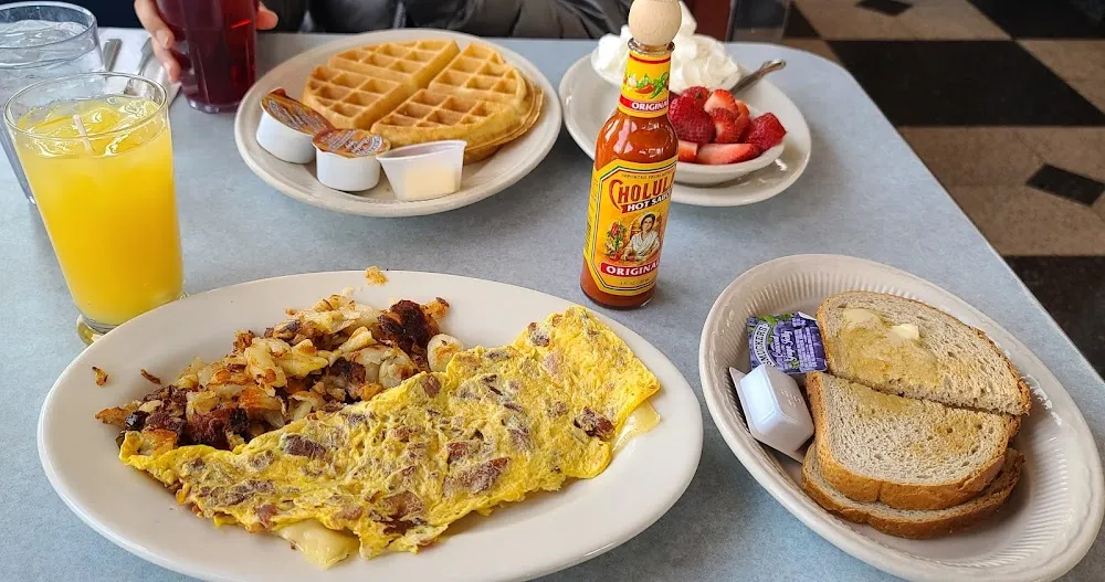 Waffle with Fresh Strawberries and Omelette